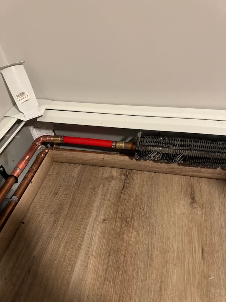 Baseboard radiator copper pipe repair