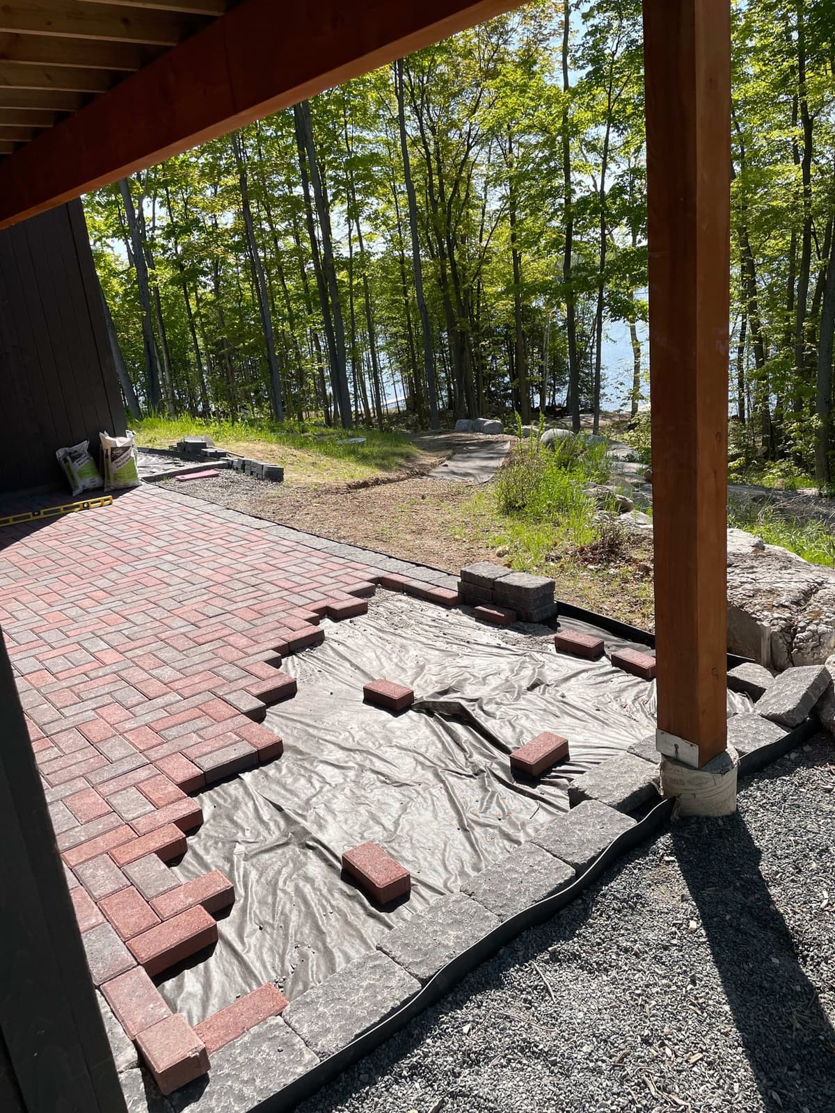 Lakeside patio construction by Relica Comforts